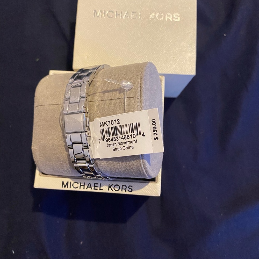 Michael’s Kors women’s watch. Silver tone.